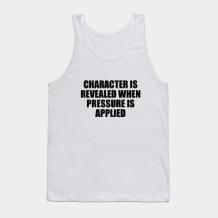 Character is revealed when pressure is applied Tank Top